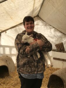 LSUHS student holding Ember.